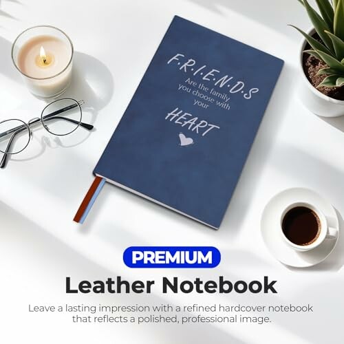Premium leather notebook on a table with glasses and coffee.